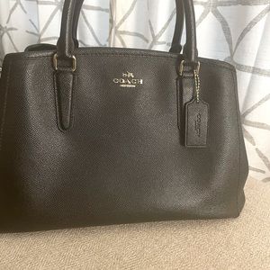 Black Coach Bag No long strap. Measures 13 in across the bottom  & 7 in height.